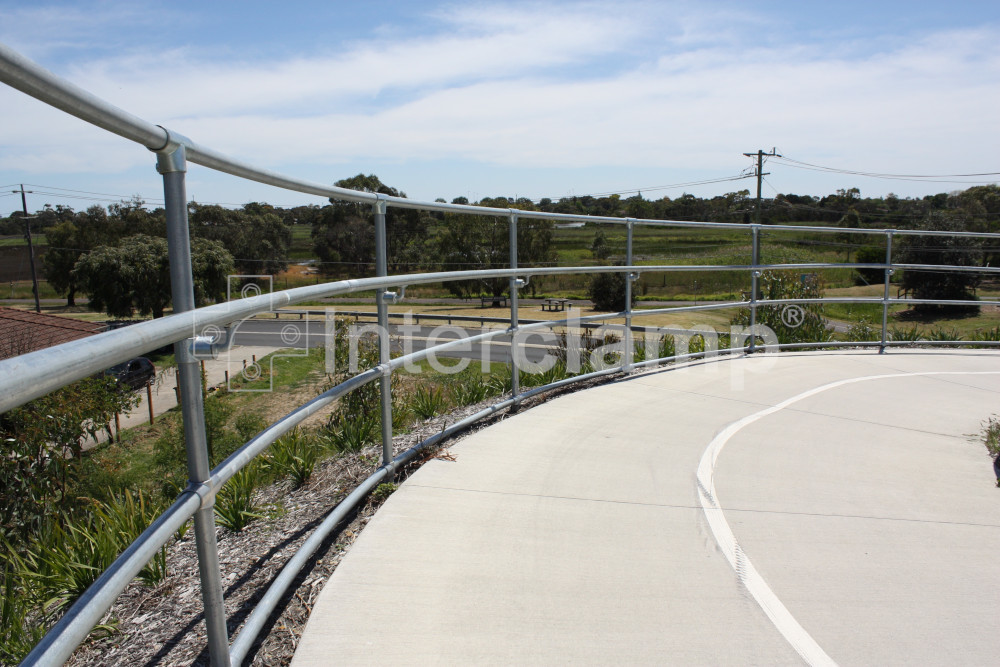 Modular guardrails providing safety for sweeping ramp section on cycle path, Melbourne, Australia